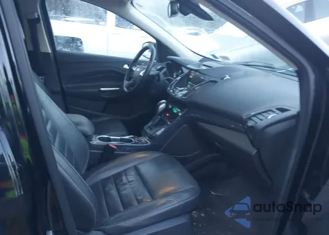 2016 Ford Escape Titanium z USA, uszkodzony, nr VIN 1FMCU9JX3GUC48727